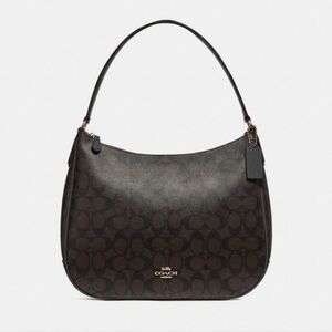 Coach signature print coated canvas and leather shoulder/ hobo bag